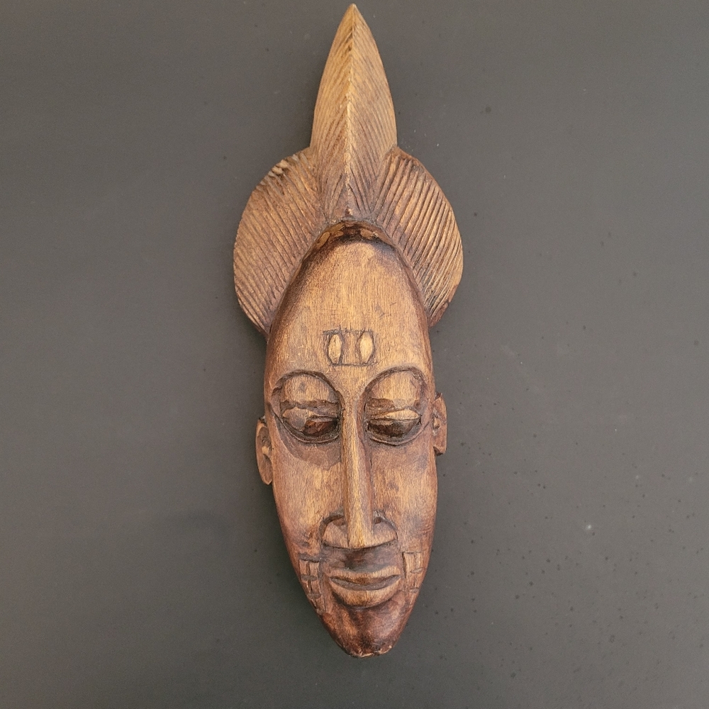 Vintage hand carved wooden African wall mask